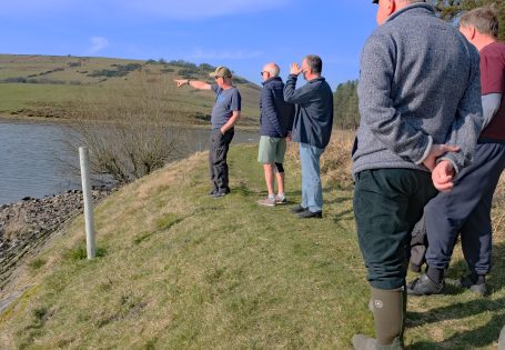 New members being shown around the fishery